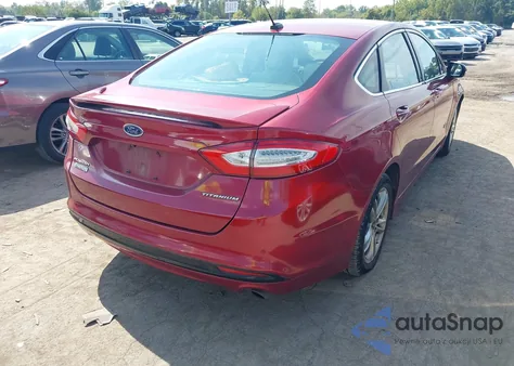 2016 Ford Fusion Energi Titanium from USA, damaged, VIN 3FA6P0SU1GR349531
